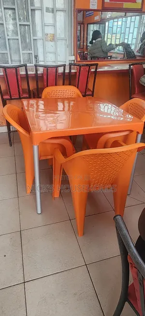 Orange Plastic Chairs With Metal Legs With Complast Plastic Table Set