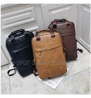 Classic Unisex Backpack. Brown And Black. Delivery Services Available.