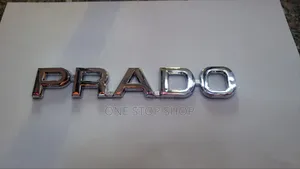 Chrome Prado Boot Letter Badge