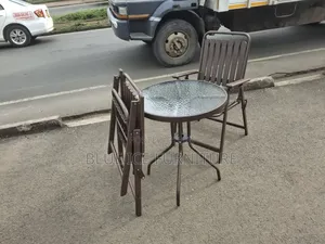 Balcon Table With Foldable Brown Chair