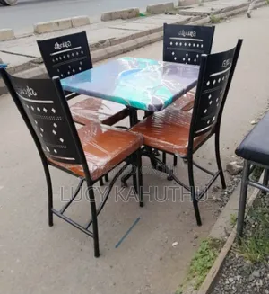 Marble Sheet Table With Powder Coated Brown Chairs