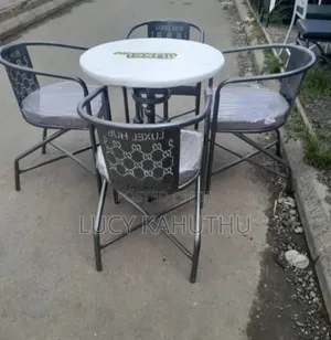 White Marble Top With Log and Laser Cut Chairs