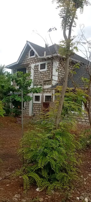 Galu Beach 3/4 Acre Plot Size With Houses, 3 Minutes to the Beach.