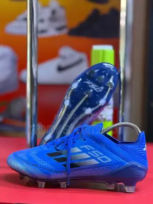 Adidas F50 Firm Ground (Fg) Soccer Cleats Vibrant Blue Color.