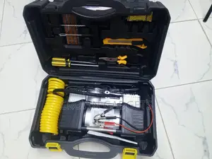 Portable Dc Car Air Compressor Tire Inflator With Puncture Repair Kit.