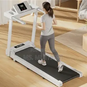White Foldable Walking Pad / Treadmill Ft Bluetooth Connectivity.