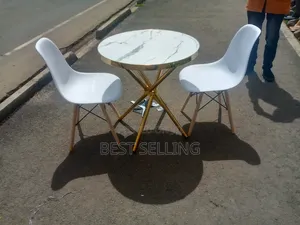 Round Table With Marble Top and Chairs