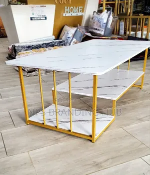 Marble Effect MDF Nesting Coffee Table Featuring a Gold Frame