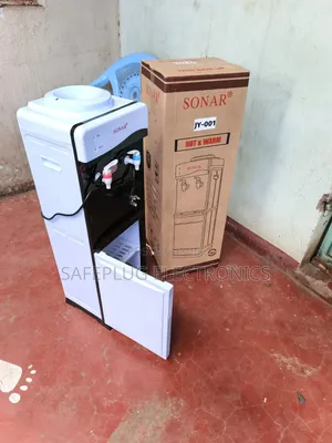 Hot and Warm Water Dispenser
A Simple Top-Loading Water Dispenser That