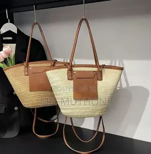 Straw Woven Beach Tote Bag With Leather Straps and a Front Pocket