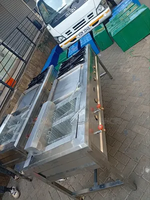 Combined Burner With Griddle And Double Gas Fryer.