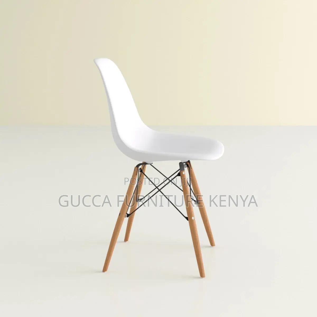 Orange Plastic Armless Eames Dining Chair