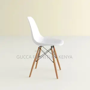 Orange Plastic Armless Eames Dining Chair