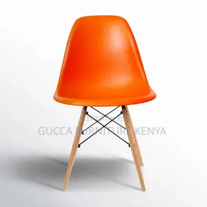 Orange Plastic Armless Eames Dining Chair