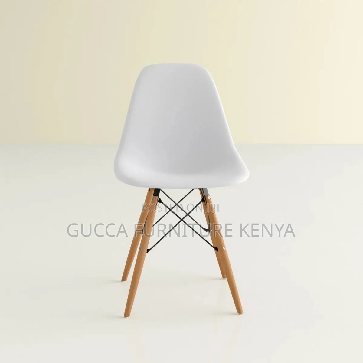Orange Plastic Armless Eames Dining Chair