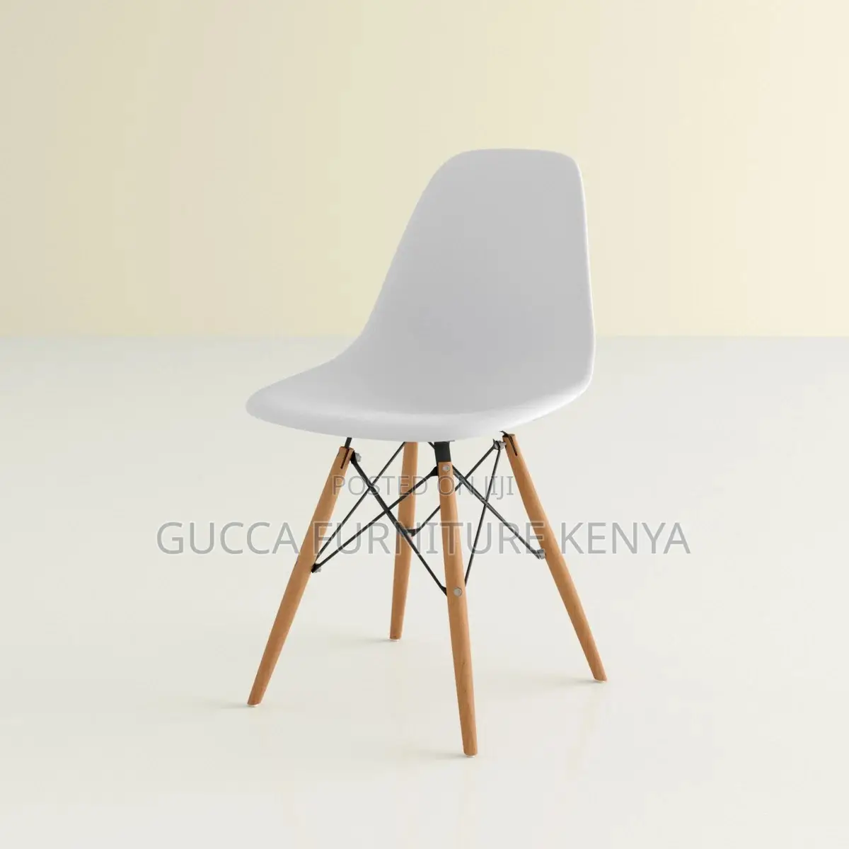 Orange Plastic Armless Eames Dining Chair