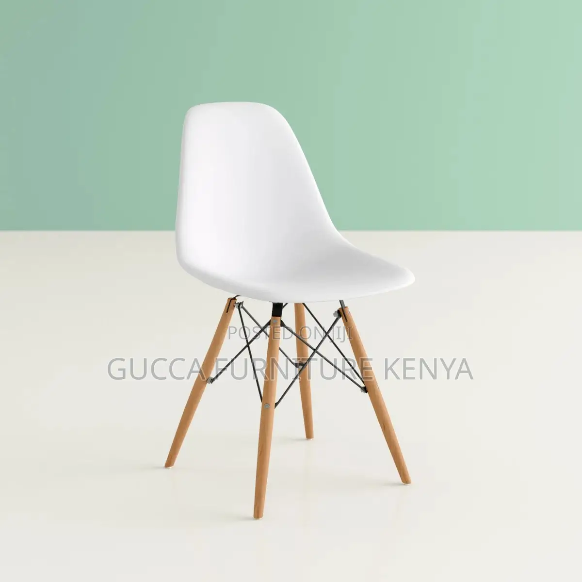 Orange Plastic Armless Eames Dining Chair