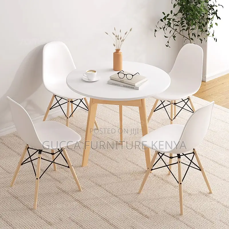 Orange Plastic Armless Eames Dining Chair