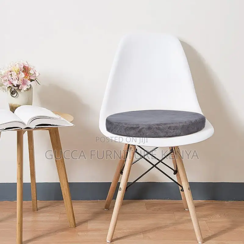 Orange Plastic Armless Eames Dining Chair
