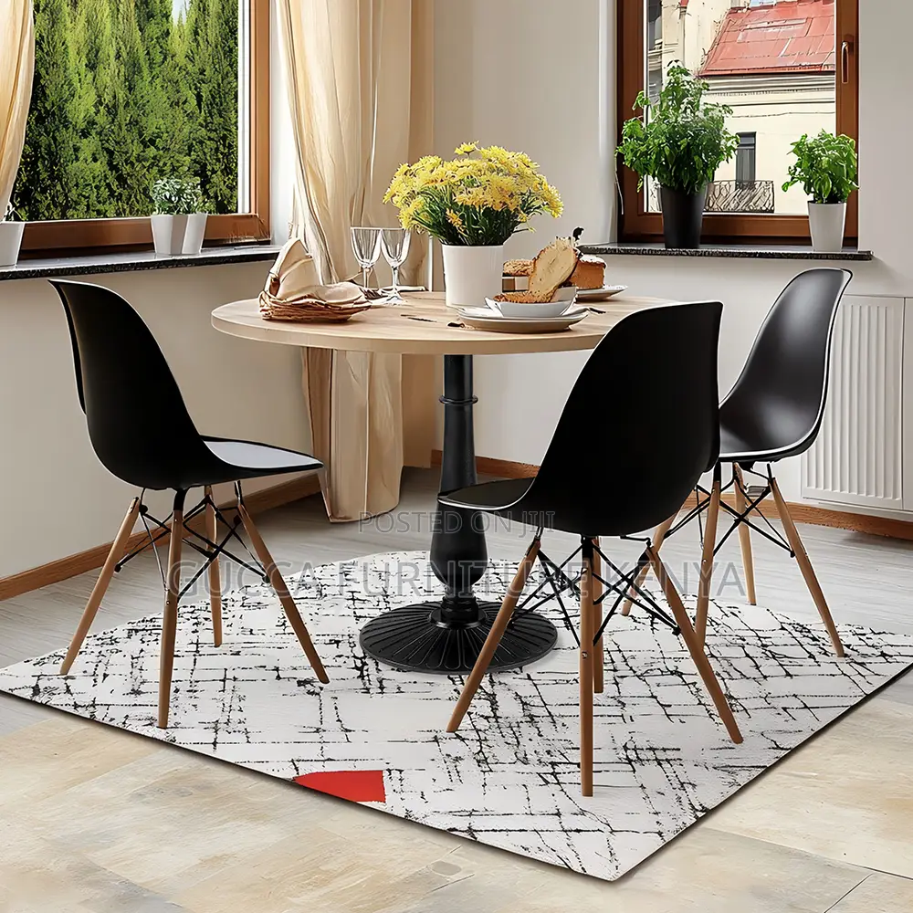 Orange Plastic Armless Eames Dining Chair