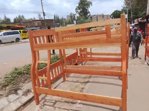 Fancy Double Decker Bed_ Hardwood Framed. 4*6 by 3.5*6