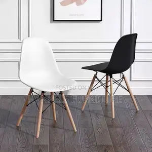 Modern Eames Plastic Chairs With Wooden Legs