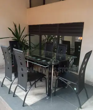 Executive Modern 6 Sitter Glass Dinning Table With Leather Seat