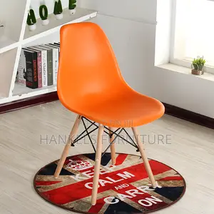 Orange Eames Plastic Bistro Chair