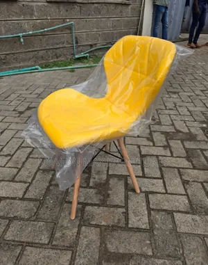 Padded Leather Eames Chairs