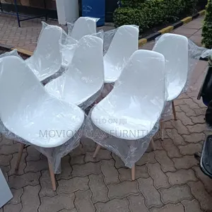 Relaxing Ottoman Eames Chairs