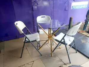 Gold Stands Round Table and Folderble Chairs
