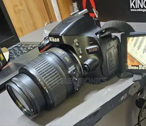 Nikon D5100 Camera With 18-55mm Lens,Battery,Charger and Strap