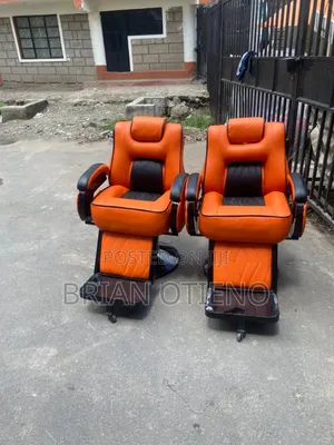 Adjustable Orange Kinyozi Chairs