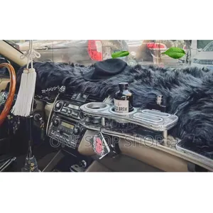 Car Dashboard Fitted With Black Fluffy Dashboard Cover