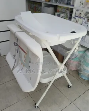 2 in 1 Foldable Baby Bath and Changing Station With Ergonomic Height.
