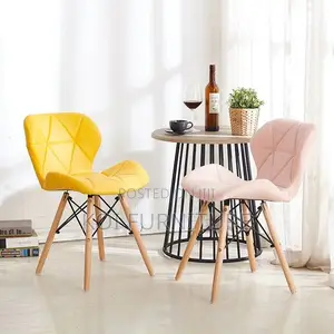 Dining Chairs; Leather Padded Eames Dining Chairs With Wooden Legs