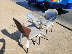 A Glass Top Dinning Table