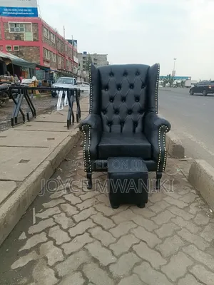 Black Leather Pedicure Queen Chair and a Pouf