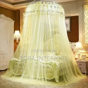 Cream Dome Mosquito Net Mounted on the Ceiling
