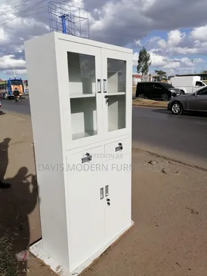 White Storage Cabinet With Glass Upper Door