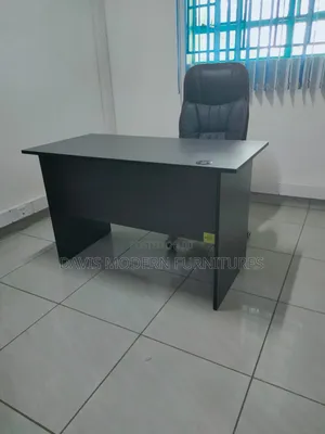 Office Chair and Black Desktop