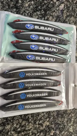Subaru/Volkswagen 4pc Per Pack Door Rubber Flexible Logo Edge Guard