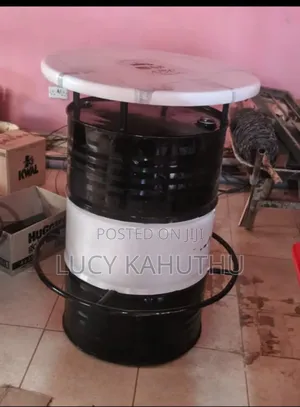Black and White Drum With Supported Leg Stand