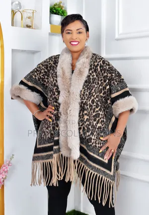 Elegant Ponchos With Fur and Beautiful Prints