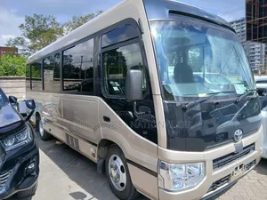 Toyota Coaster 2019 Beige