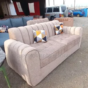Beige Chesterfield Three-Seater Sofa