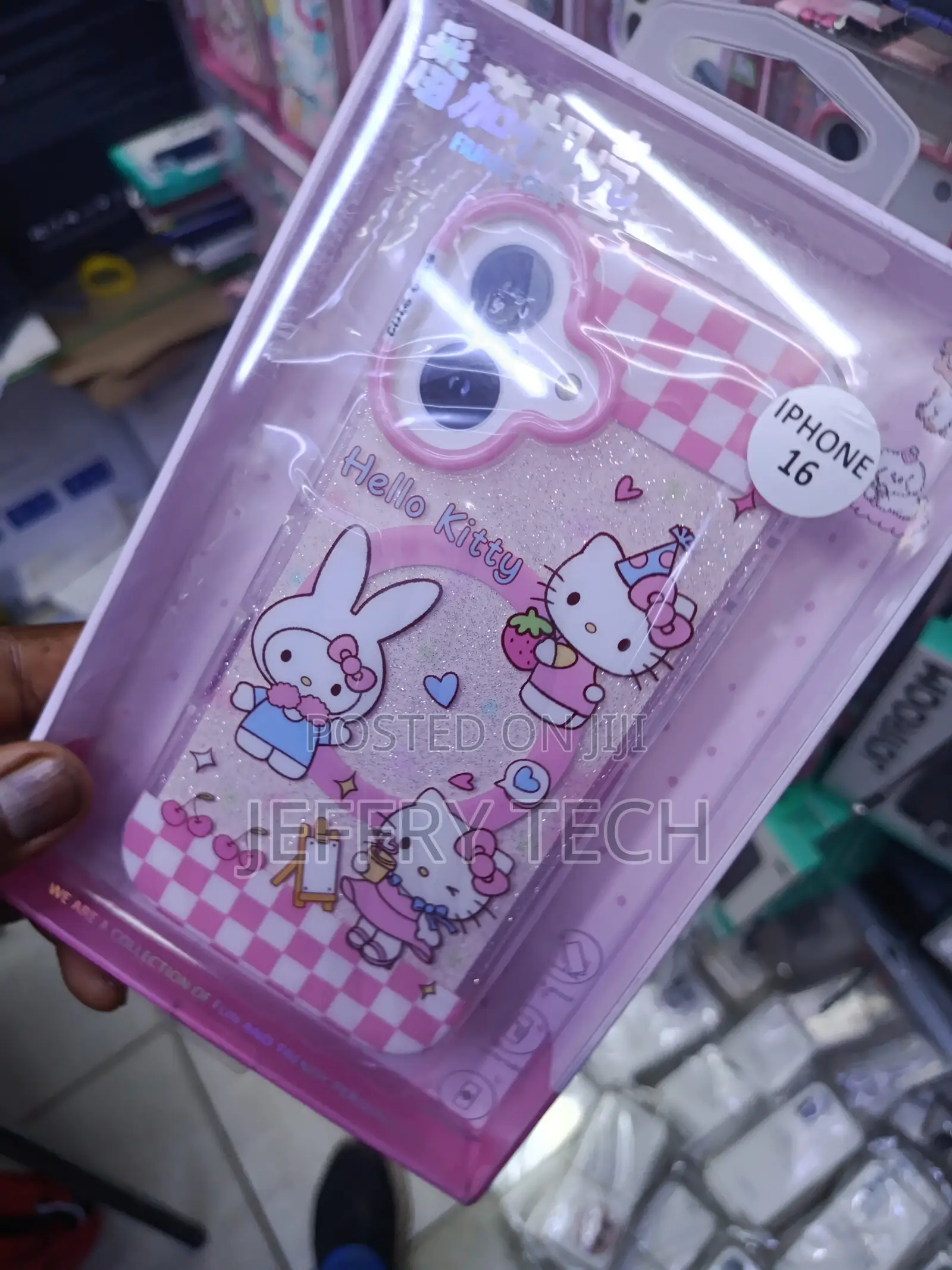 Hello Kitty Themed Glitter Protective Phone Case for iPhone 16.