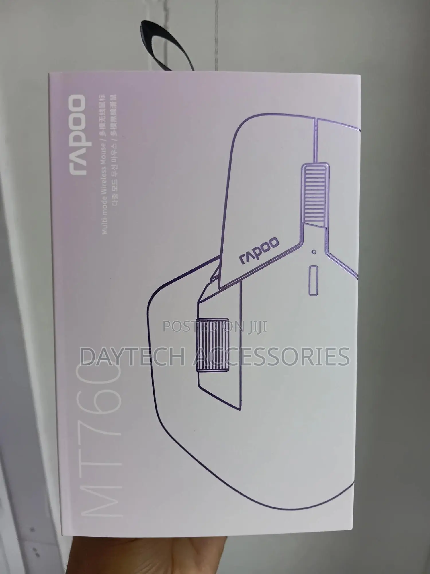Rapoo Mt760l Multi-Device Wireless Mouse in White Packaging.