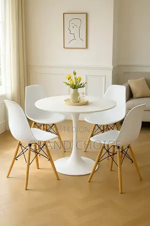 4 Seater Round Dining Table With Eames Chairs