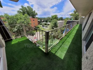 Veranda Faux Lawn Flooring | Peaceful Green Corner Setup